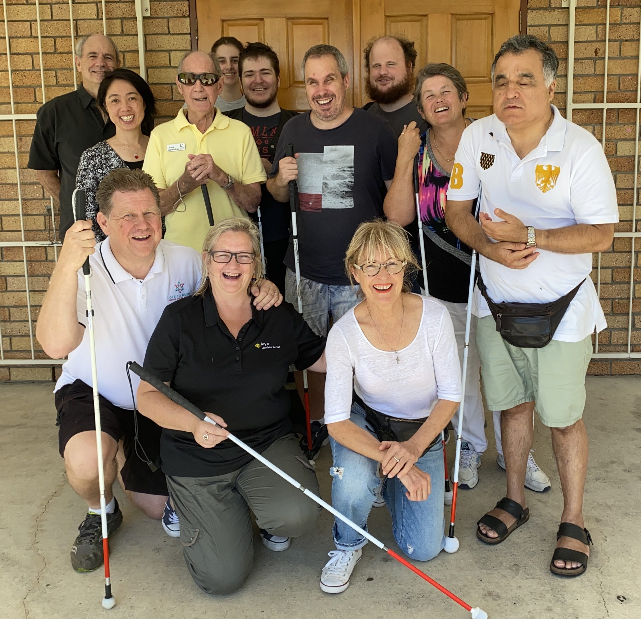 Small group of smiling at the camera at recreational event